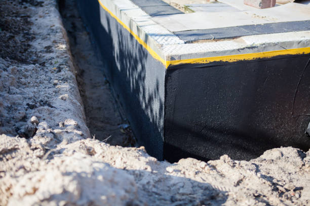 Professional Emergency Waterproofing technician working in Glenbeulah, WI